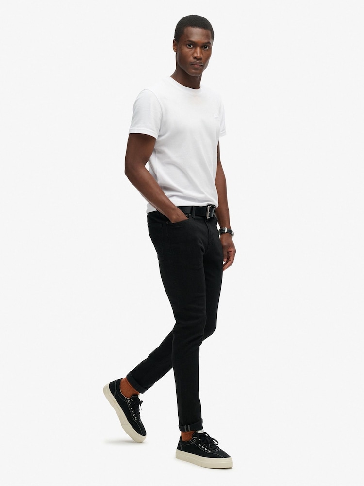 Черный - Superdry Cotton Slim Jeans - Image 1 of 7 Черный - Superdry Cotton Slim Jeans - Image 1 of 7