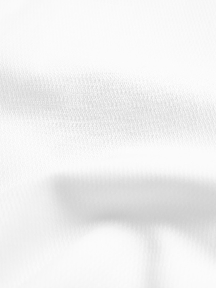 Blanco - Camisa ajustada con diseño texturizado de cuidado fácil con puños sencillos - Imagen 8 de 8 Blanco - Camisa ajustada con diseño texturizado de cuidado fácil con puños sencillos - Imagen 8 de 8