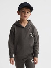 Reiss Olive Cade Relaxed Garment Dyed Logo Hoodie - Image 1 of 6