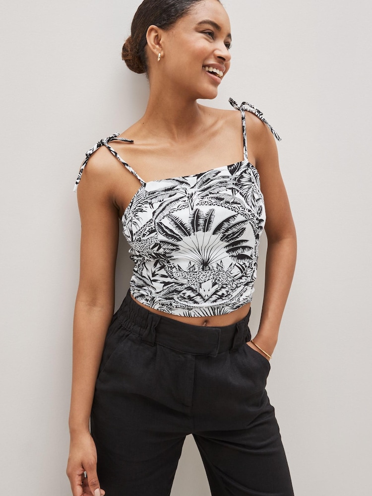 Black/White Large Floral Tie Shoulder Cami Top - Image 1 of 4 Black/White Large Floral Tie Shoulder Cami Top - Image 1 of 4