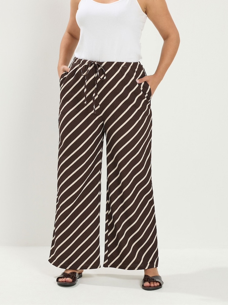 Yours Curve Brown Horizontal Stripe Wide Leg Trousers - Image 1 of 5 Yours Curve Brown Horizontal Stripe Wide Leg Trousers - Image 1 of 5