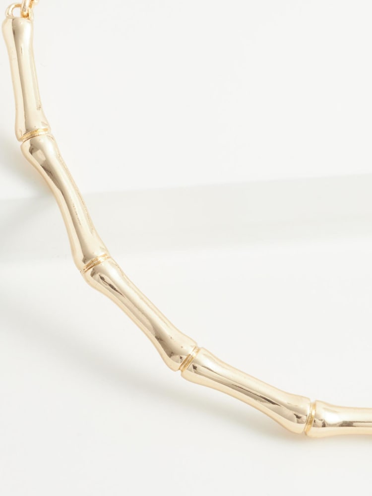 Gold Tone Recycled Metal Bamboo Slim Torque Necklace - Image 5 of 5 Gold Tone Recycled Metal Bamboo Slim Torque Necklace - Image 5 of 5