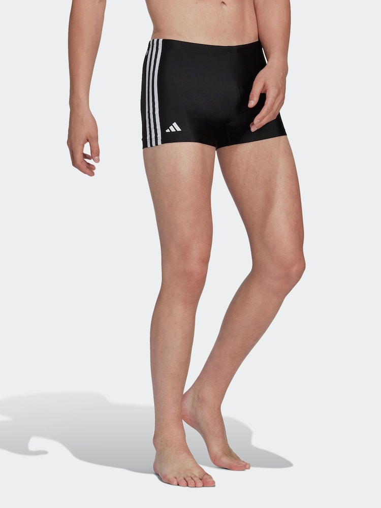 أسود - بوكسر سباحة كلاسيكي 3 خطوط من Adidas - صورة 2 من 6 أسود - بوكسر سباحة كلاسيكي 3 خطوط من Adidas - صورة 2 من 6