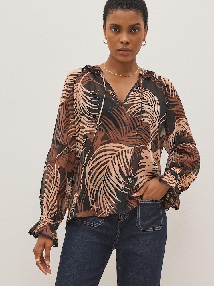 Black & Grey Feather Print Long Sleeve V-Neck Sheer Blouse with Lace Trim Detail - Image 1 of 4