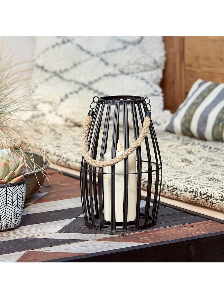 Lights4fun Black Slatted Outdoor Lantern with Truglow LED Candle - Image 1 of 5 Lights4fun Black Slatted Outdoor Lantern with Truglow LED Candle - Image 1 of 5