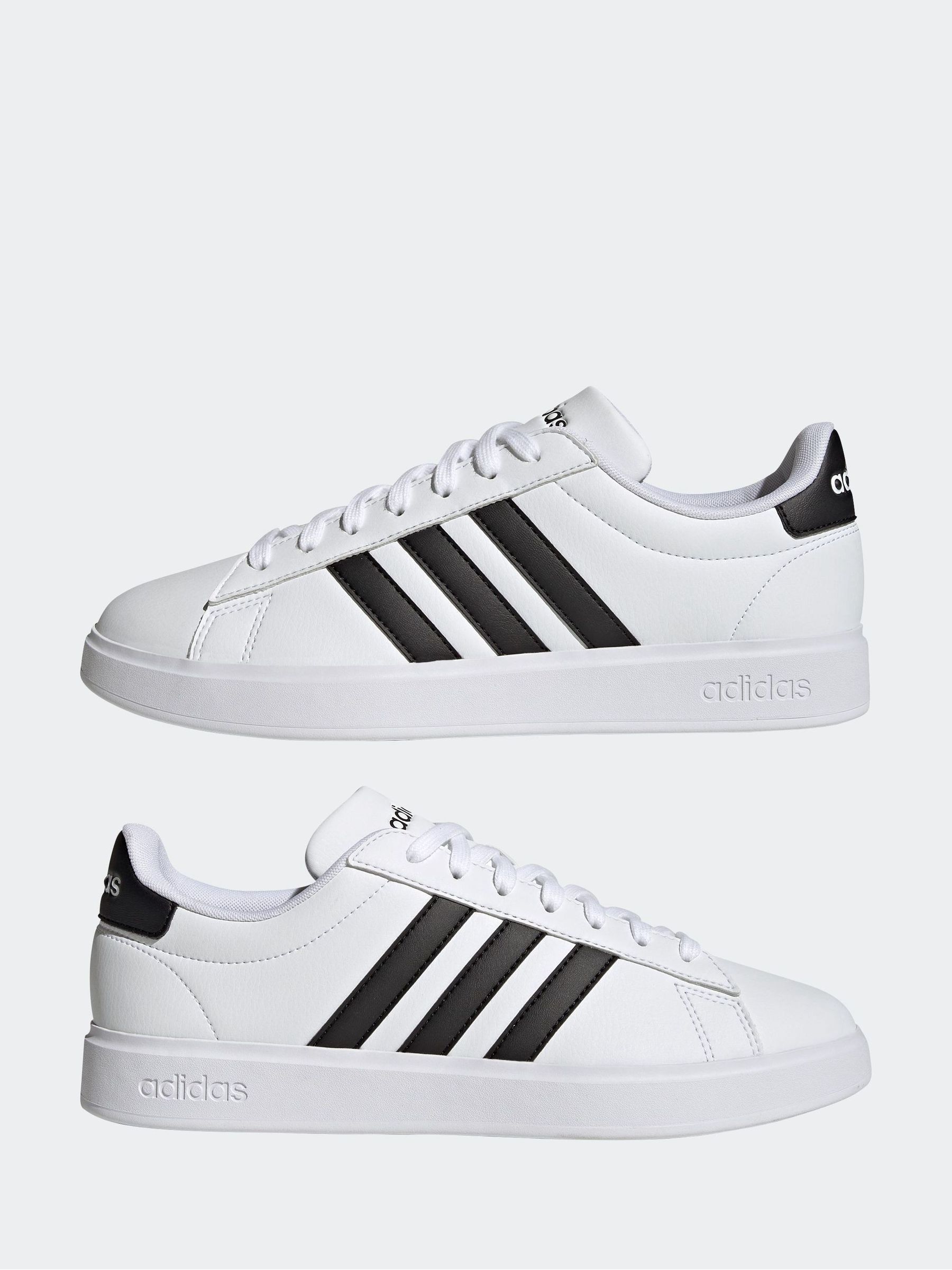 Womens black adidas with white stripes outlet