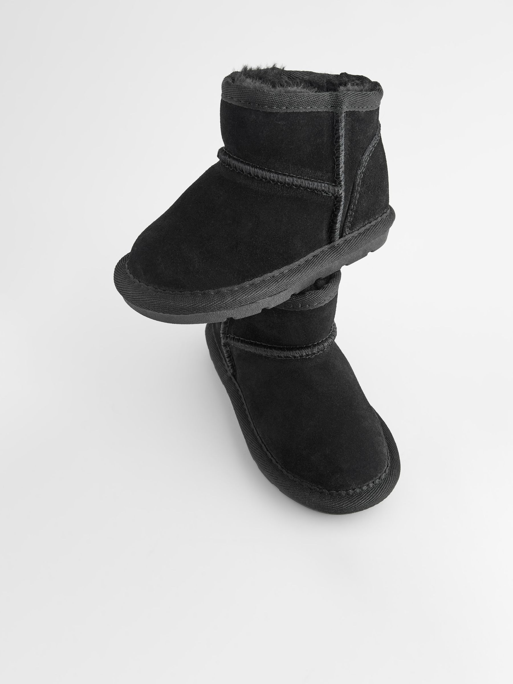 Buy Black Suede Mini Faux Fur Lined Water Repellent Pull On Suede Boots from Next Luxembourg