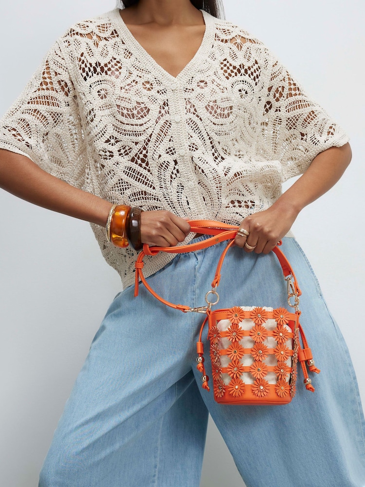 River Island Orange 3D Floral Cut Out Bucket Bag - Image 1 of 6