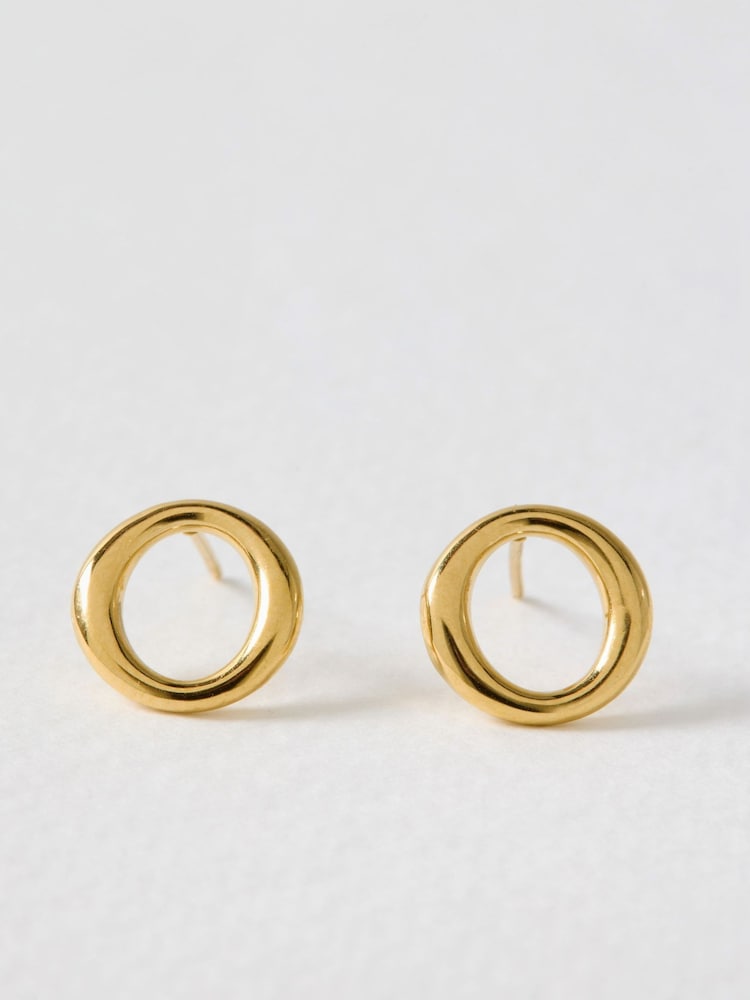 Oliver Bonas Gold Eden Gold Tone Waterproof Circle Stud Earrings - Image 1 of 3 Oliver Bonas Gold Eden Gold Tone Waterproof Circle Stud Earrings - Image 1 of 3