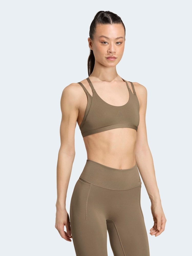 adidas Cream Optime Workout Strappy Light Support Bra - Image 1 of 7 adidas Cream Optime Workout Strappy Light Support Bra - Image 1 of 7