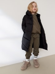 Black Longer Length Shower Resistant Faux Fur Lined Hooded Padded Coat (3-16yrs) - Image 1 of 9