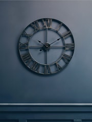 Fifty Five South Black Genova Metal Wall Clock - Image 1 of 4