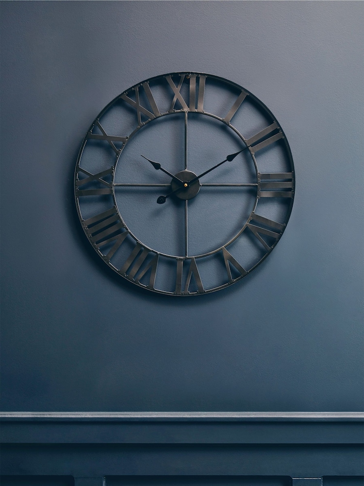Fifty Five South Black Genova Metal Wall Clock - Image 1 of 4