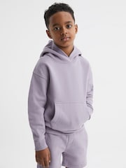 Flieder - Reiss Alexander Oversize-Kapuzensweatshirt aus Baumwolljersey - Bild 1 von 6