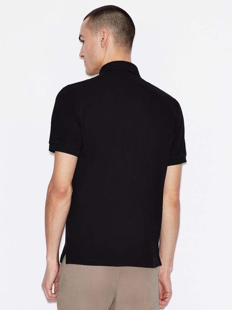 قميص بولو بشعار دائري صغير لون أسود من Armani Exchange - صورة 2 من 12
