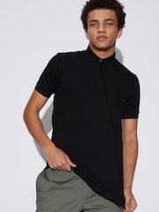 قميص بولو بشعار دائري صغير لون أسود من Armani Exchange - صورة 9 من 12