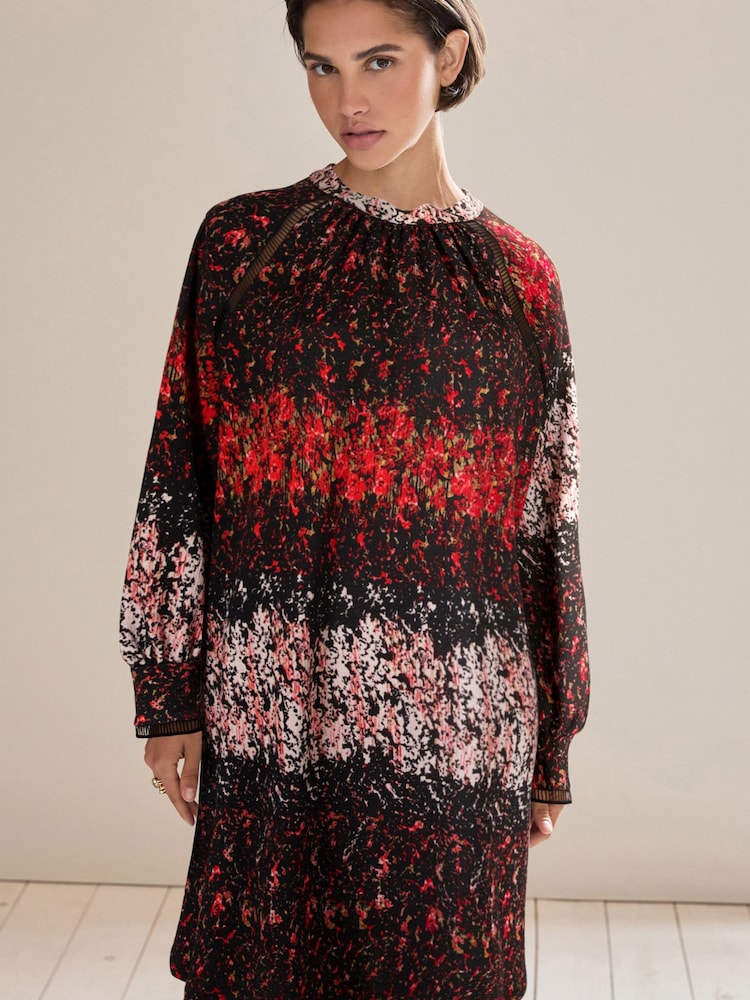 Black and Red Ditsy Long Sleeve Ladder Detail Mini Dress - Image 1 of 5 Black and Red Ditsy Long Sleeve Ladder Detail Mini Dress - Image 1 of 5