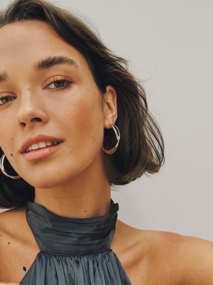 Silver Tone Cross Over Hoop Earrings - Image 1 of 5
