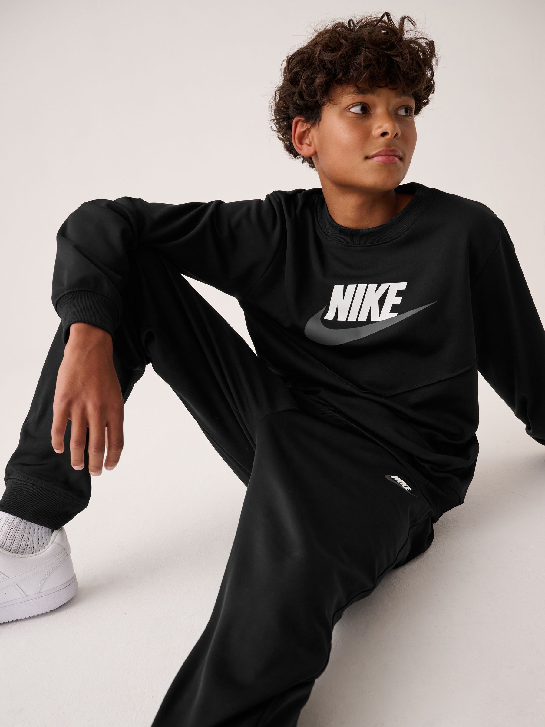 next nike tracksuit