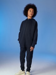 Azul marino - Conjunto de sudadera y pantalones deportivos con diseño técnico (3-16 años) - Imagen 1 de 6
