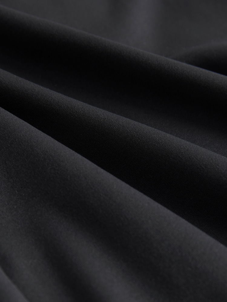 Schwarz - Superweiche, ausgestellte Yoga-Sportleggings mit Dry-Tech - Bild 8 von 8 Schwarz - Superweiche, ausgestellte Yoga-Sportleggings mit Dry-Tech - Bild 8 von 8