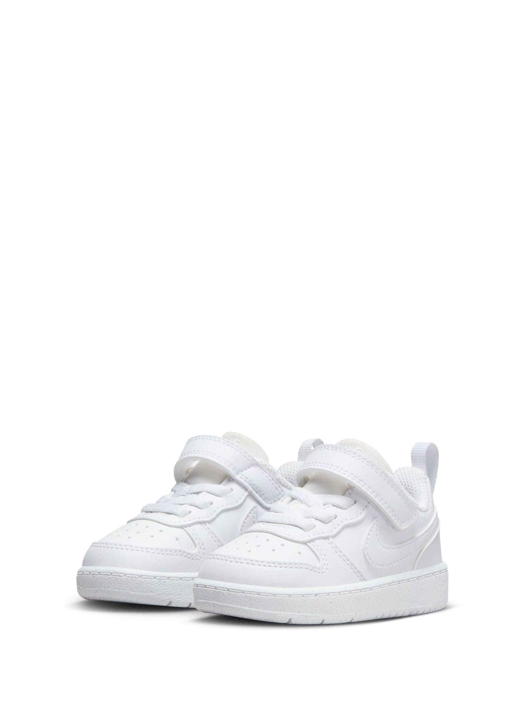 white nike shoes with velcro strap