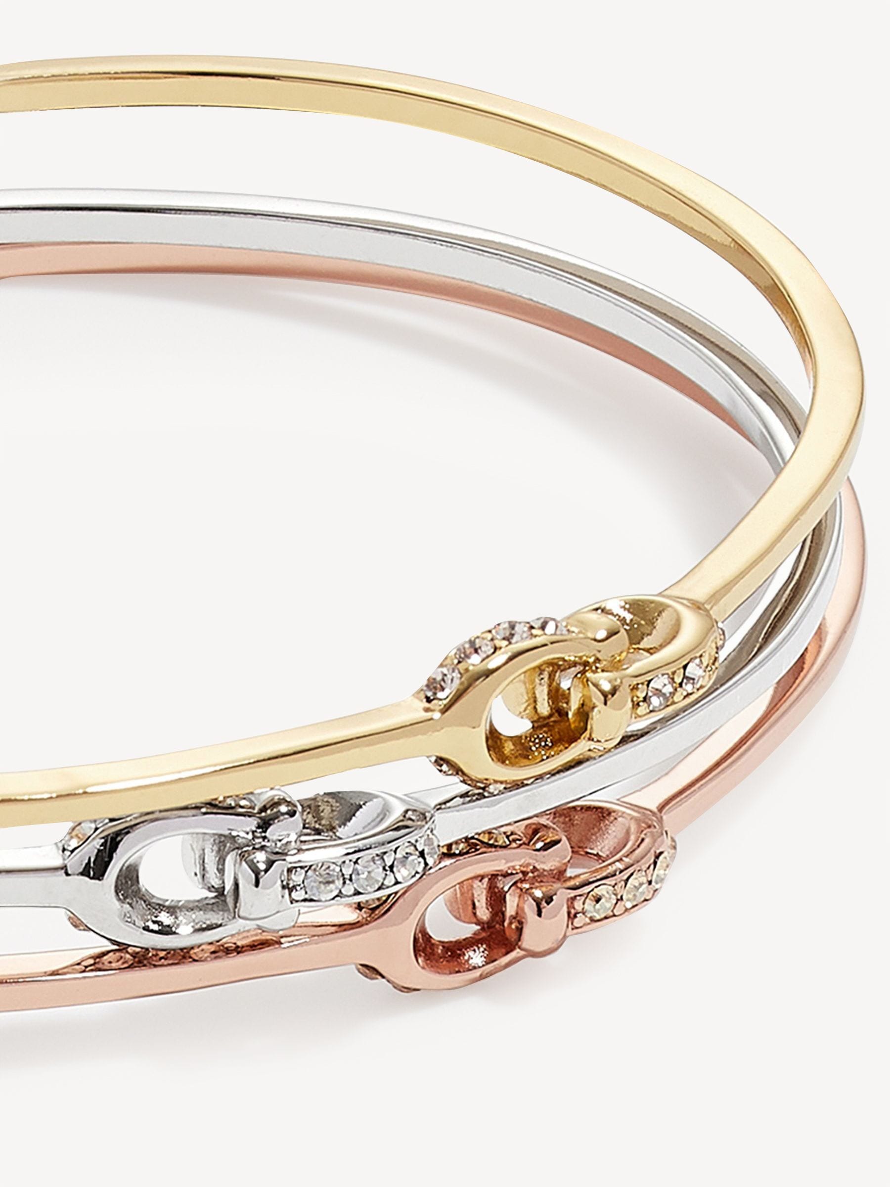 Buy COACH Gold Tone Interlocking Signature C Stone Bangle Bracelet