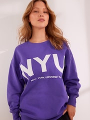 Violet Purple NYU Graphic Sweatshirt - Image 1 of 7