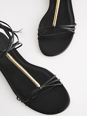 Black Signature Leather Flat Strappy Sandals with Metallic Wrap Detailing - Image 8 of 9