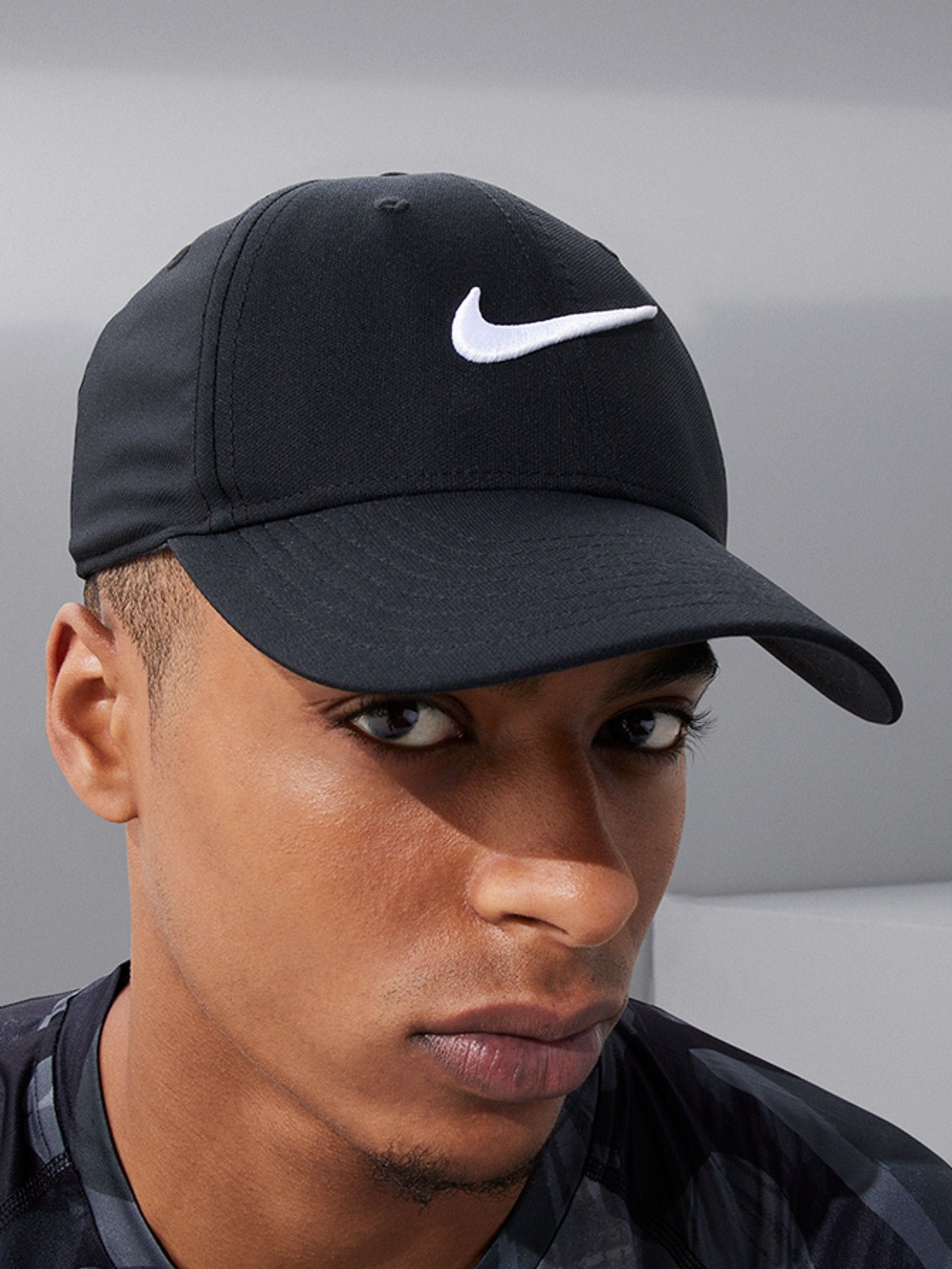 Kaufe Sie Schwarz Nike Dri fit Club Strukturierte Cap mit Swooshlogo bei Next Deutschland