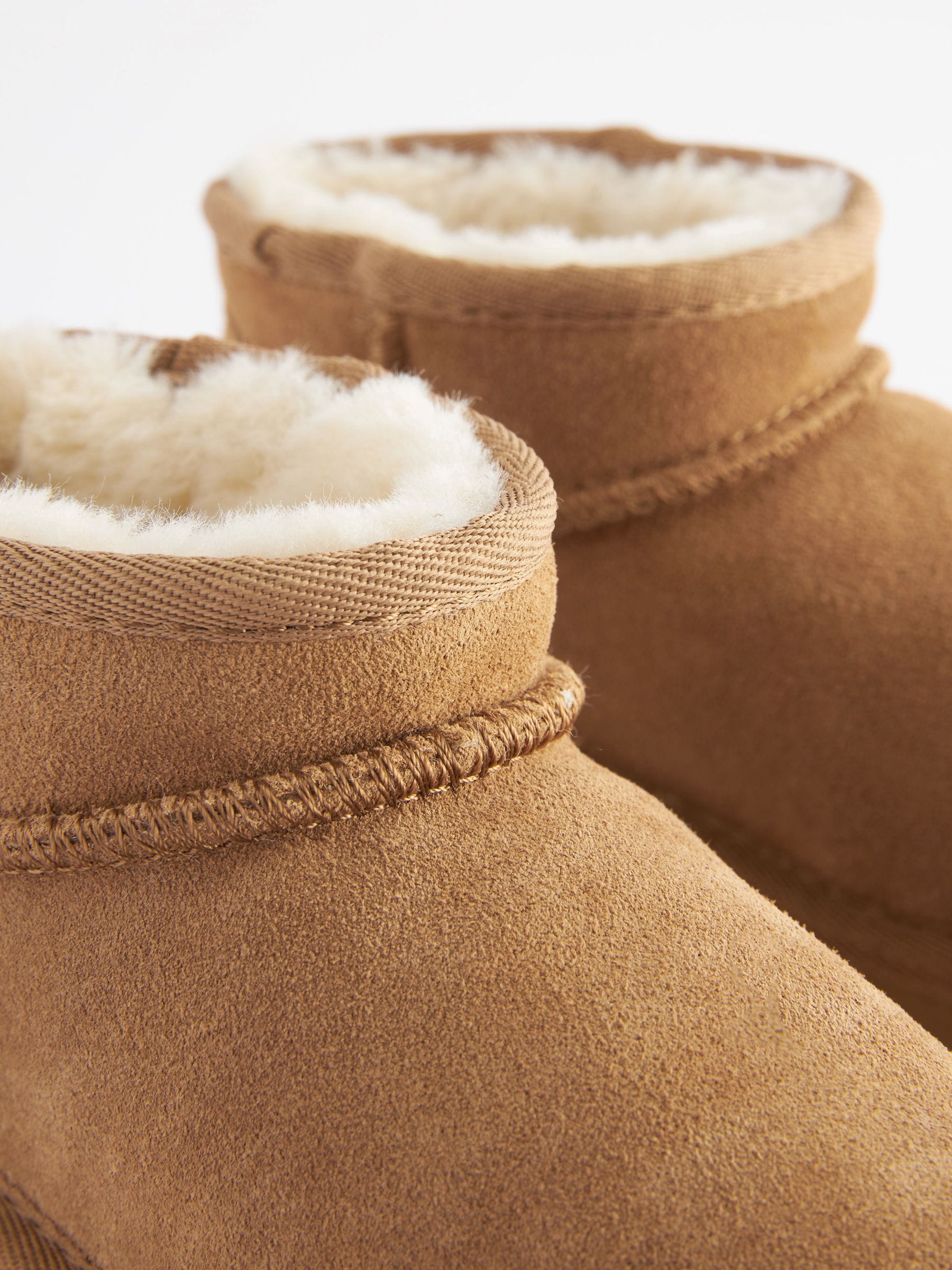 Suede pull on boots top