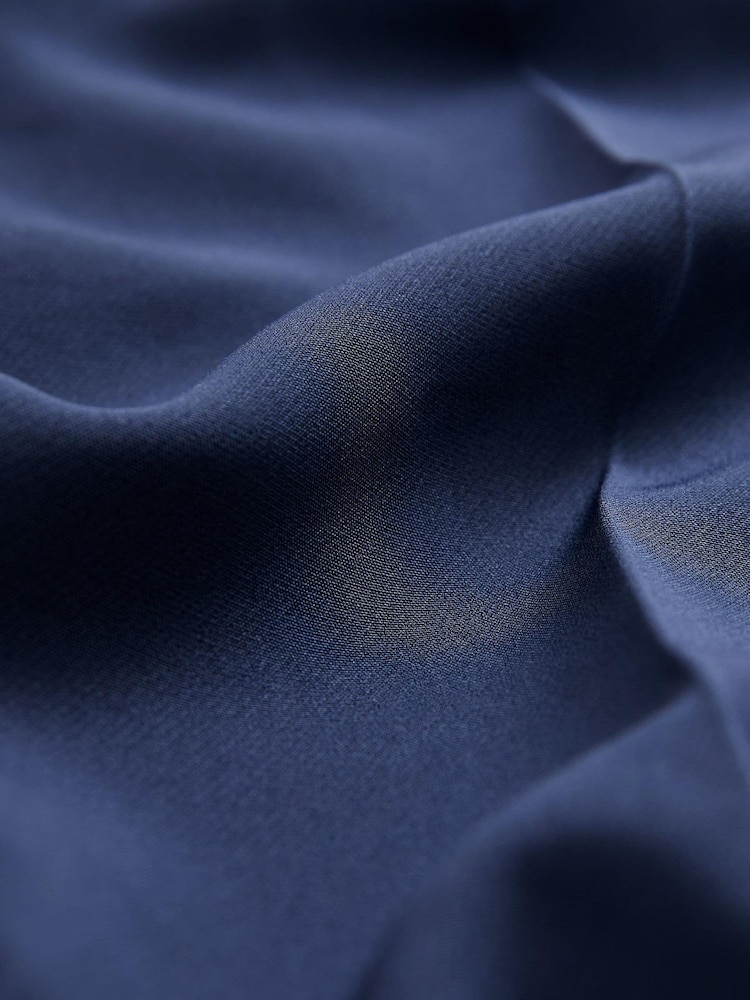 Marineblau - Taillierte, schmal zulaufende Hose mit Knopfleiste - Bild 6 von 6 Marineblau - Taillierte, schmal zulaufende Hose mit Knopfleiste - Bild 6 von 6