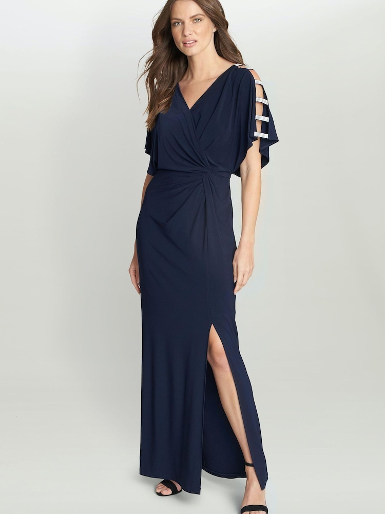 Gina Bacconi Blue Pascale Long Knot Front Jersey Dress With Front Slit & Ladder Embellishment Detail On Sleeves - Image 1 of 6 Gina Bacconi Blue Pascale Long Knot Front Jersey Dress With Front Slit & Ladder Embellishment Detail On Sleeves - Image 1 of 6