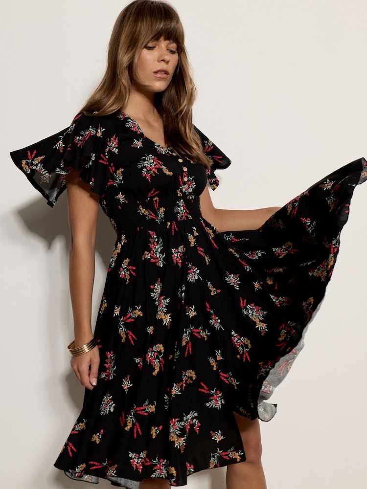 Apricot Black Botanical Floral Smocked Midi Dress - Image 2 of 5 Apricot Black Botanical Floral Smocked Midi Dress - Image 2 of 5