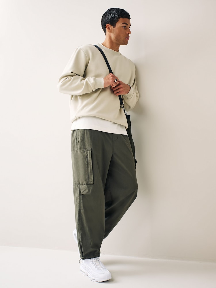 Khaki Green Wide Relaxed Parachute Cargo Trousers - Image 1 of 12 Khaki Green Wide Relaxed Parachute Cargo Trousers - Image 1 of 12
