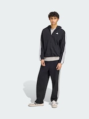 سترة منسوجة مقاومة للرياح تصميم 3 خطوط من adidas Essentials - صورة 1 من 4