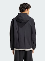 سترة منسوجة مقاومة للرياح تصميم 3 خطوط من adidas Essentials - صورة 3 من 4