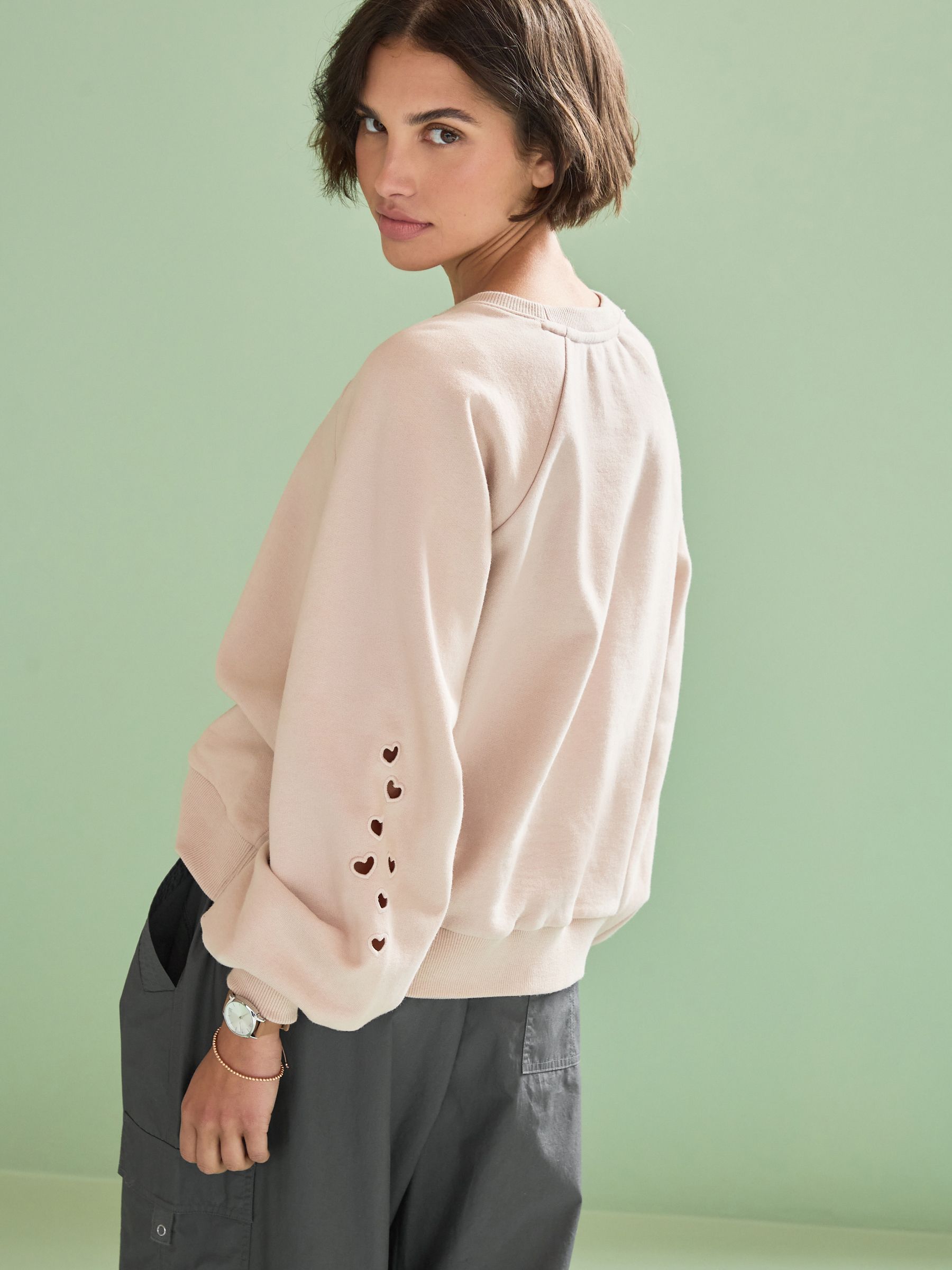 Buy Light Pink Heart Cut-Out Detail Sweatshirt from Next