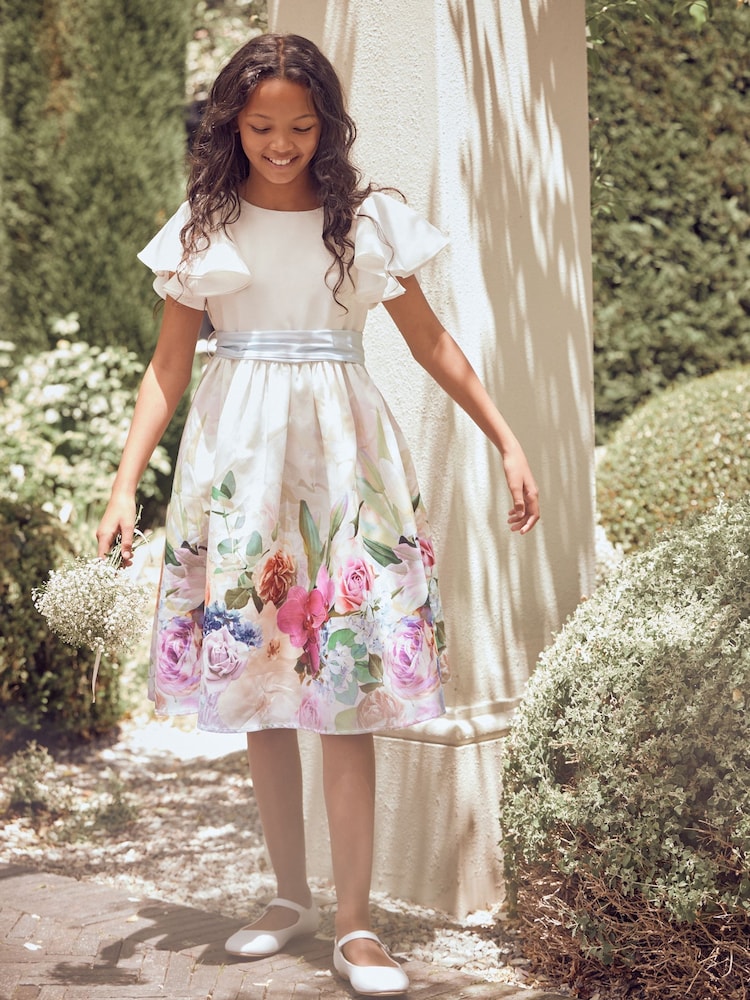 Angel & Rocket White Border Print Sylvie Ruffle Shoulder Bow Dress - Image 1 of 15 Angel & Rocket White Border Print Sylvie Ruffle Shoulder Bow Dress - Image 1 of 15