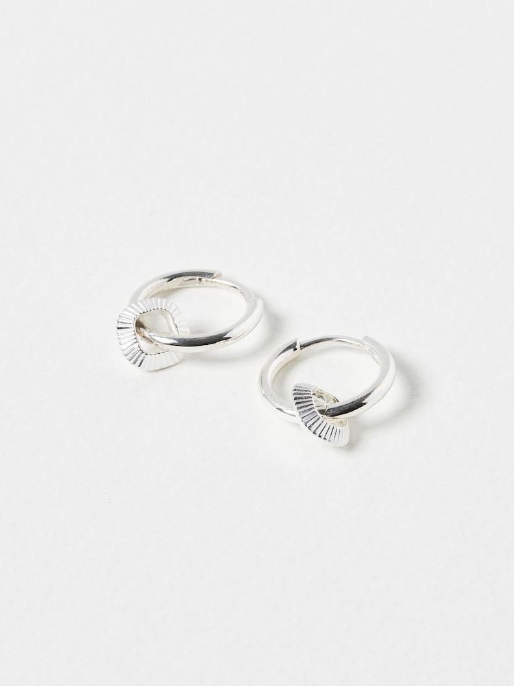 Oliver Bonas Silver Tone Angel Geometric Charm Drop Huggie Earrings - Image 1 of 3 Oliver Bonas Silver Tone Angel Geometric Charm Drop Huggie Earrings - Image 1 of 3