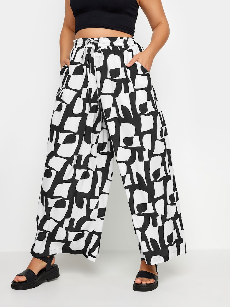 Yours Curve Black LIMITED COLLECTION  Abstract Print Drawstring Wide Leg Trousers - Image 1 of 5