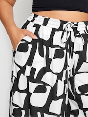 Yours Curve Black LIMITED COLLECTION  Abstract Print Drawstring Wide Leg Trousers - Image 4 of 5