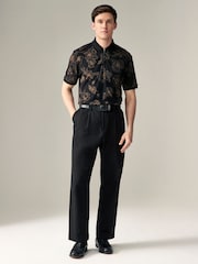 Schwarz/Blumenmuster - Signature Polo-Shirt aus Modal - Bild 3 von 8