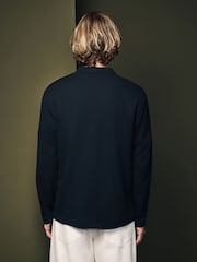 Schwarz - Langärmeliges Poloshirt aus 100 % Baumwolle mit Waffelstruktur - Bild 3 von 7