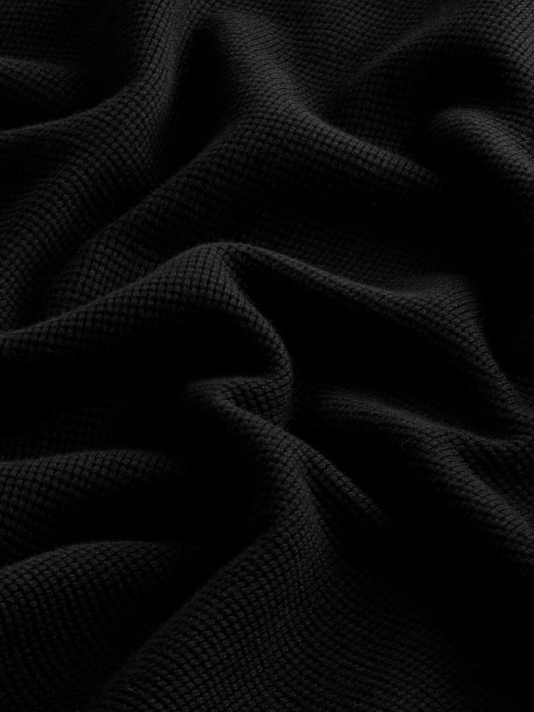 Schwarz - Langärmeliges Poloshirt aus 100 % Baumwolle mit Waffelstruktur - Bild 7 von 7