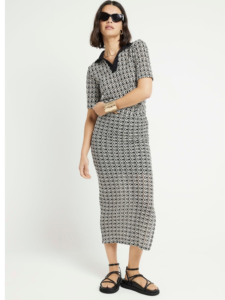 River Island Black Oversized Mono Print 100% Cotton Polo Top - Image 1 of 4 River Island Black Oversized Mono Print 100% Cotton Polo Top - Image 1 of 4