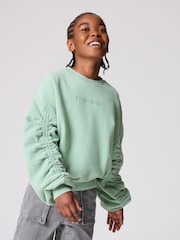 smALLSAINTS Sage Green Girls Oversized Cygni Ruched Sleeve Sweatshirt. - Image 2 of 8