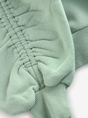 smALLSAINTS Sage Green Girls Oversized Cygni Ruched Sleeve Sweatshirt. - Image 8 of 8