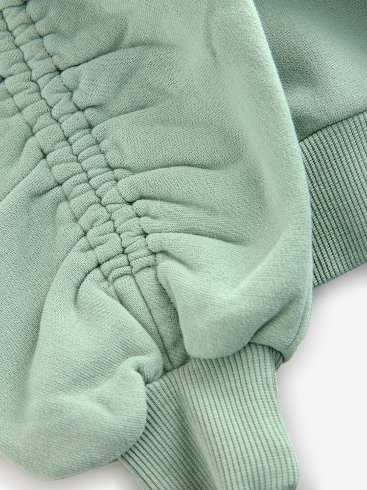 smALLSAINTS Sage Green Girls Oversized Cygni Ruched Sleeve Sweatshirt. - Image 8 of 8