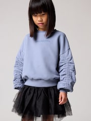 smALLSAINTS Mid Blue Girls Oversized Cygni Ruched Sleeve Sweatshirt. - Image 1 of 7